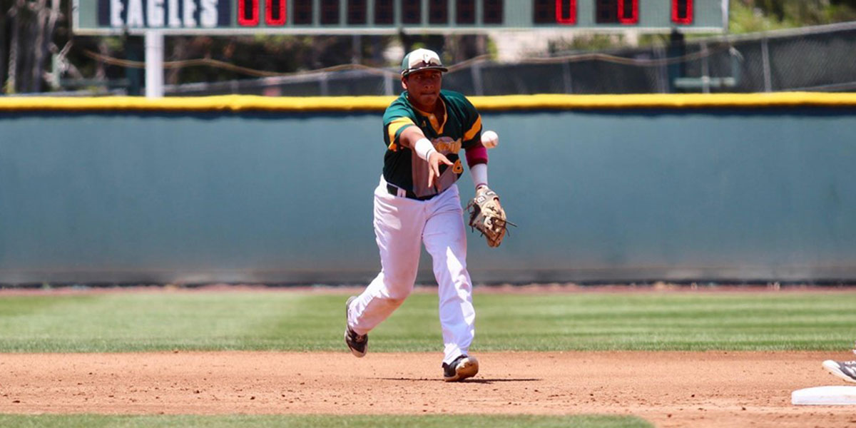 CUI baseball player turning a double play
