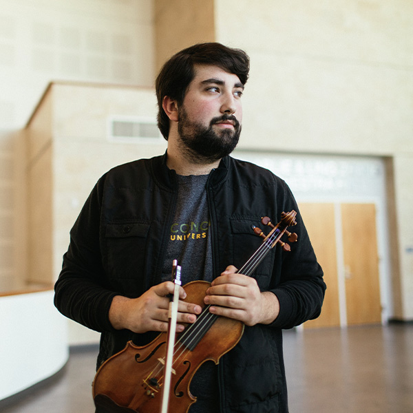 Aris with his violin