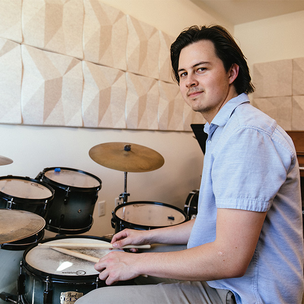 Daniel playing the drums