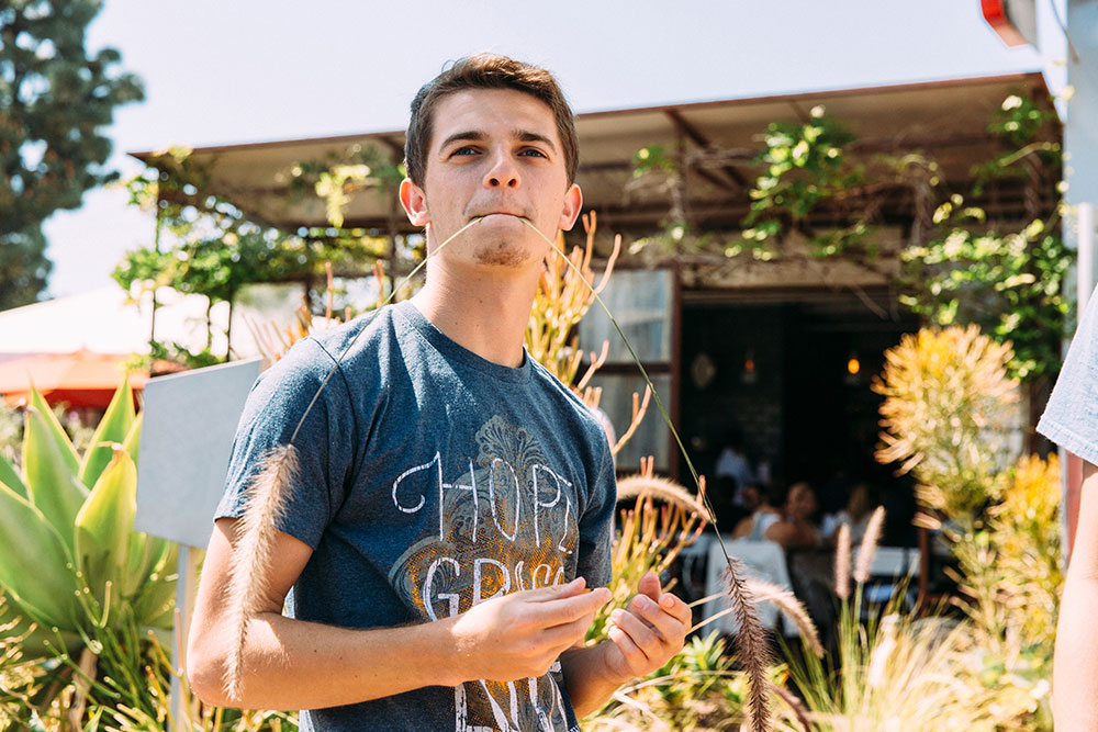 Student outside of a shopping center