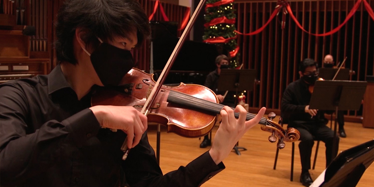 Student Playing the Violin 