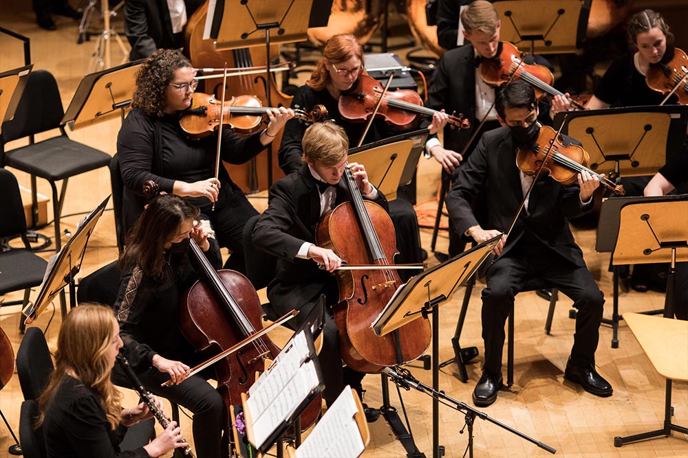 Students performing from orchestra