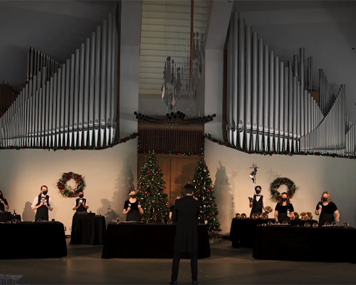 handbell musicians performing in the CU center