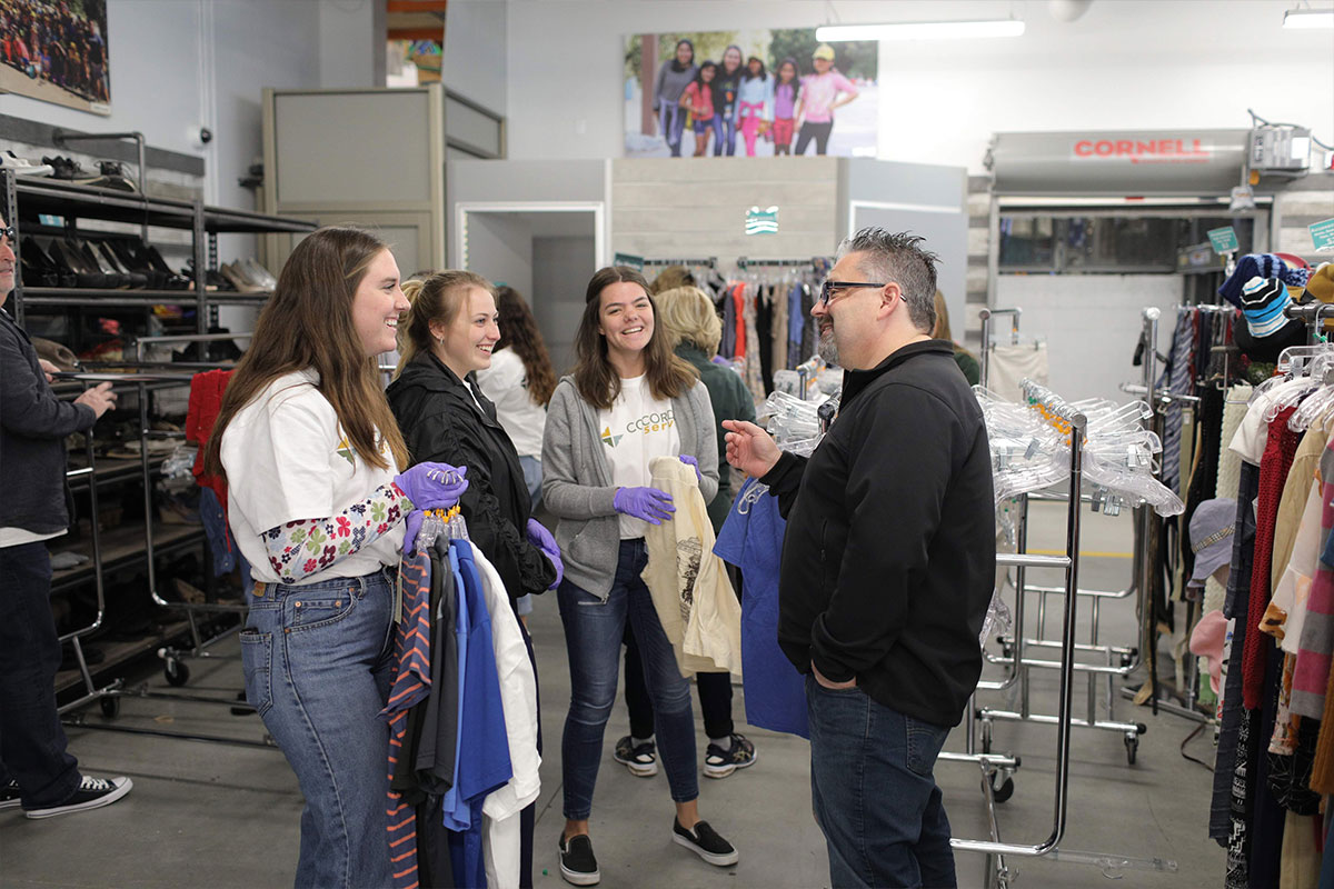 President Thomas speaking with students