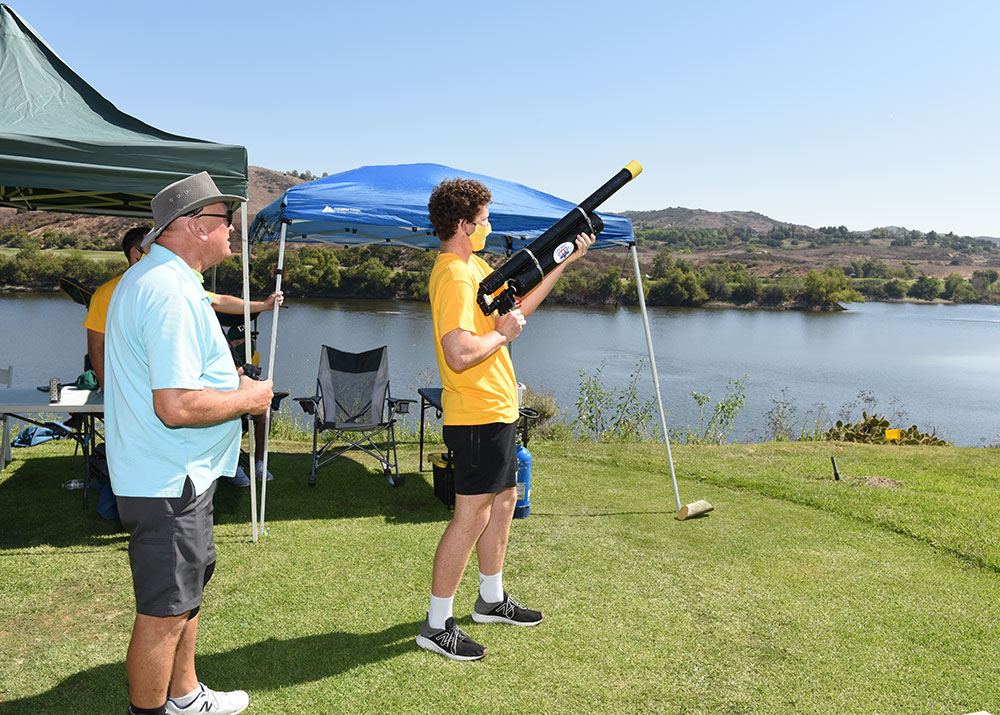 People playing a game at the Eagle Golf Classic