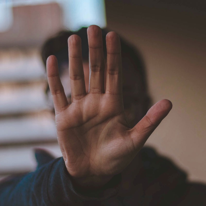 Hand symbolizing a stop sign