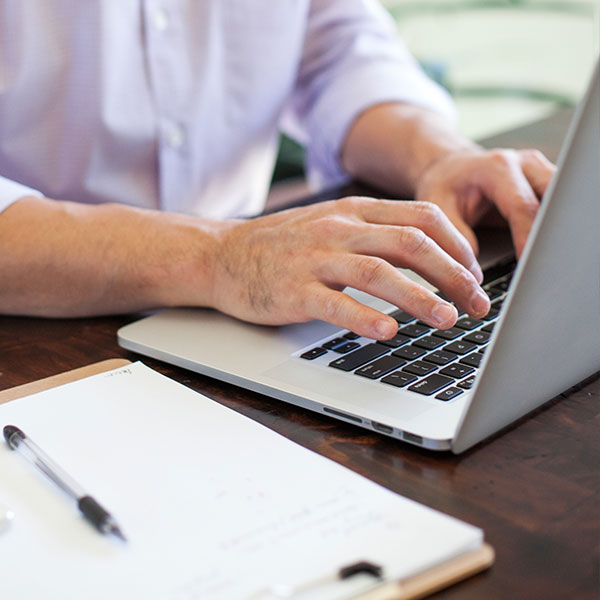 Male on a computer