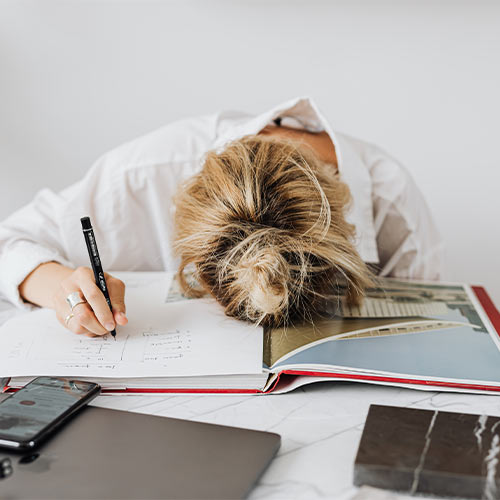 Student Slumped Over at Desk