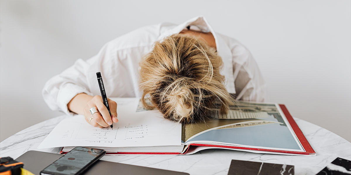 Student Slumped Over at Desk