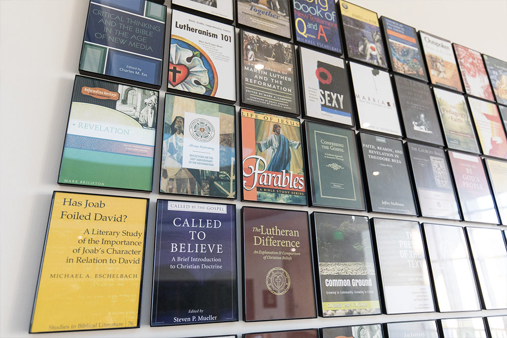 Framed literary works of the Christ College Faculty
