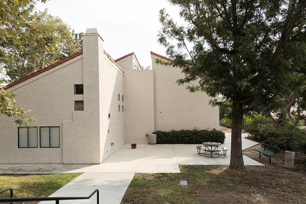  The patio outside Chi Alpha is a popular location for students and faculty to engage in conversation.