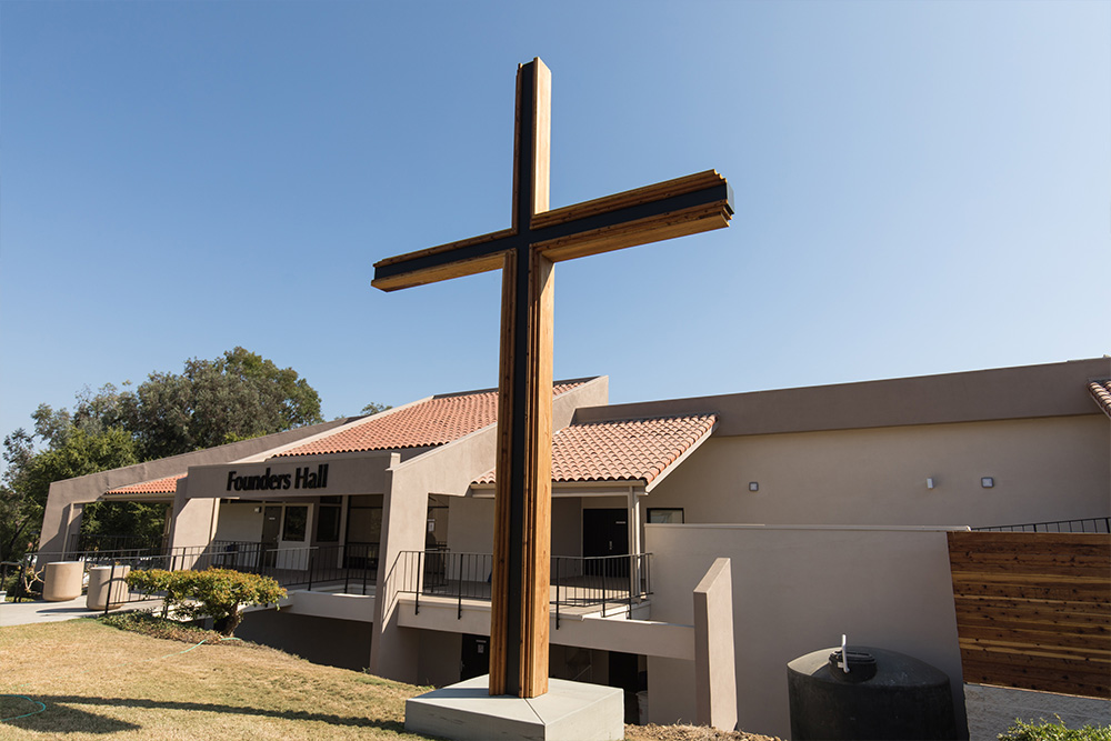 A cross installed outside Founders Hall in 2020 honors Concordia’s heritage of faith.