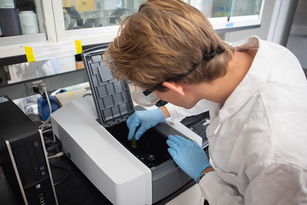 A student in process of testing in a science lab at Concordia