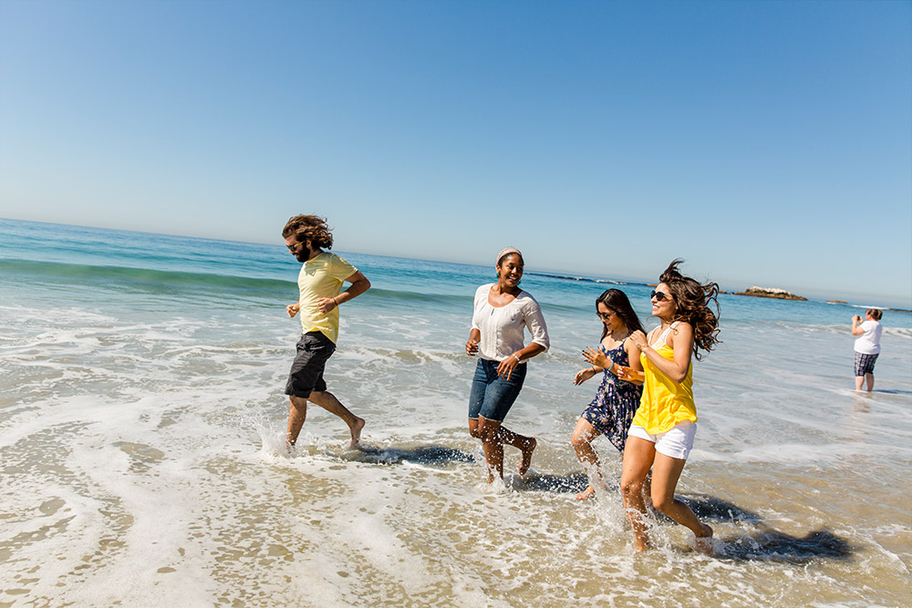 Students enjoy a day at the beach.