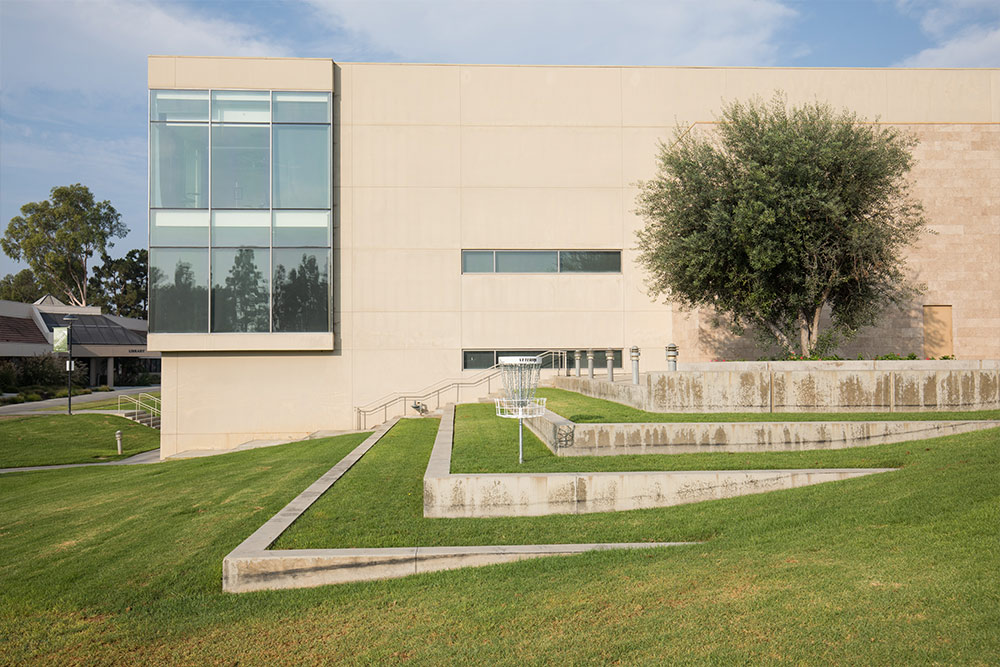 The terraces of Grimm Hall lawn provide casual seating and a stop on the Frisbee golf course.