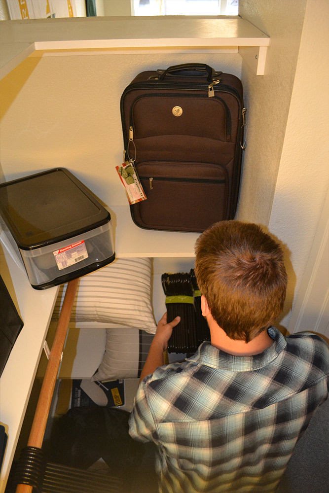 An overhead view of a dorm walk-in closet