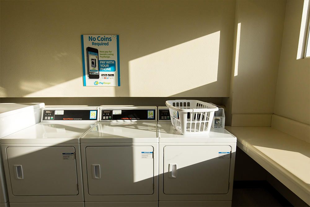 Washing machines in the laundry room at Chi Rho