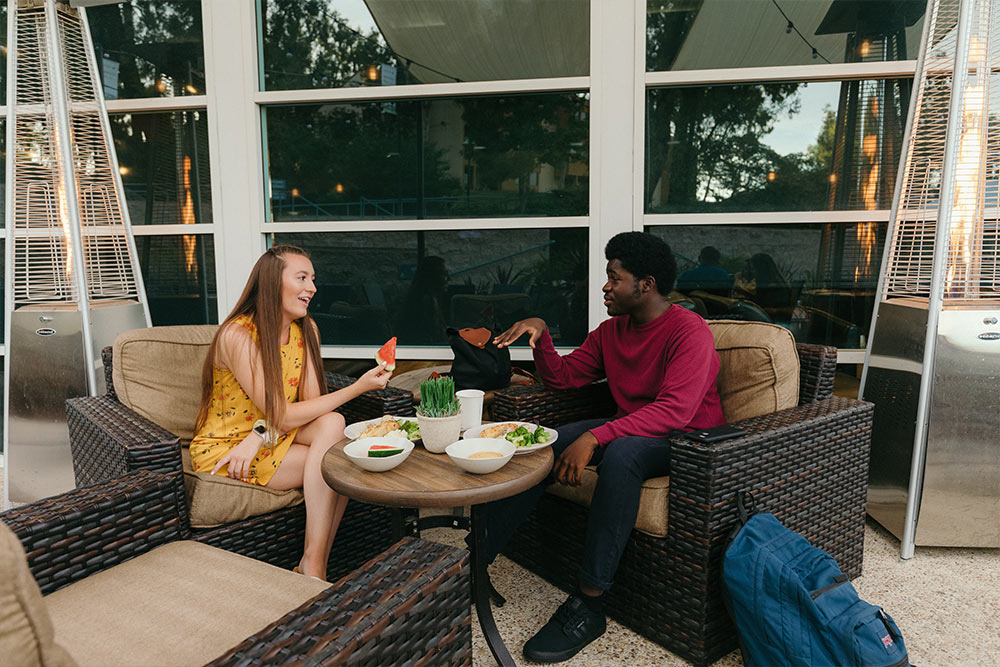 Students enjoy outdoor dining at the Eagle’s Landing.