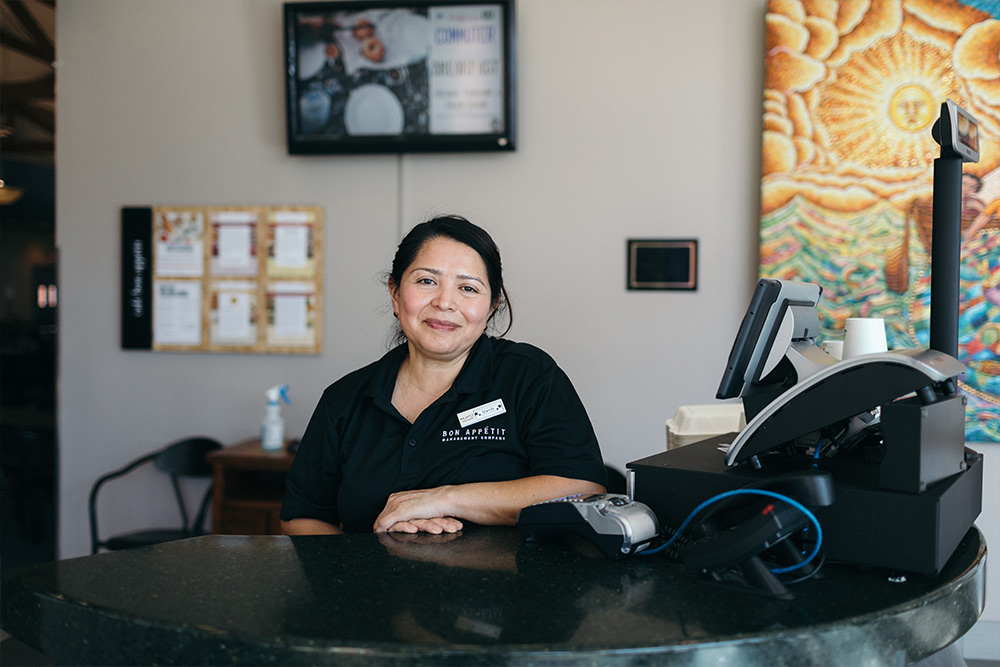 Aracely greets students each day in the Caf.