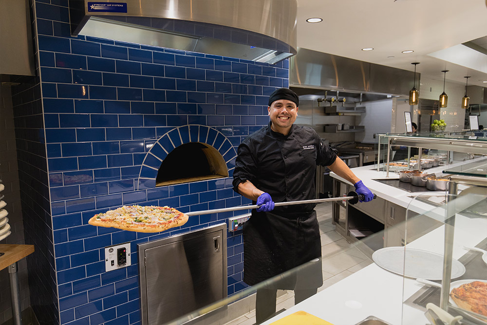  The Cafeteria features a pizza oven with a variety of pizzas made daily.