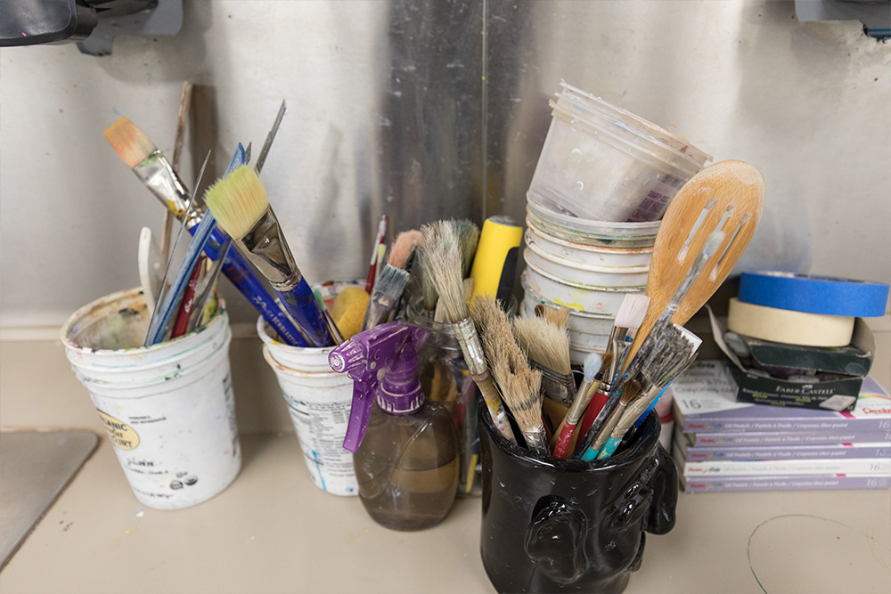 A detail of art supplies in the art studio
