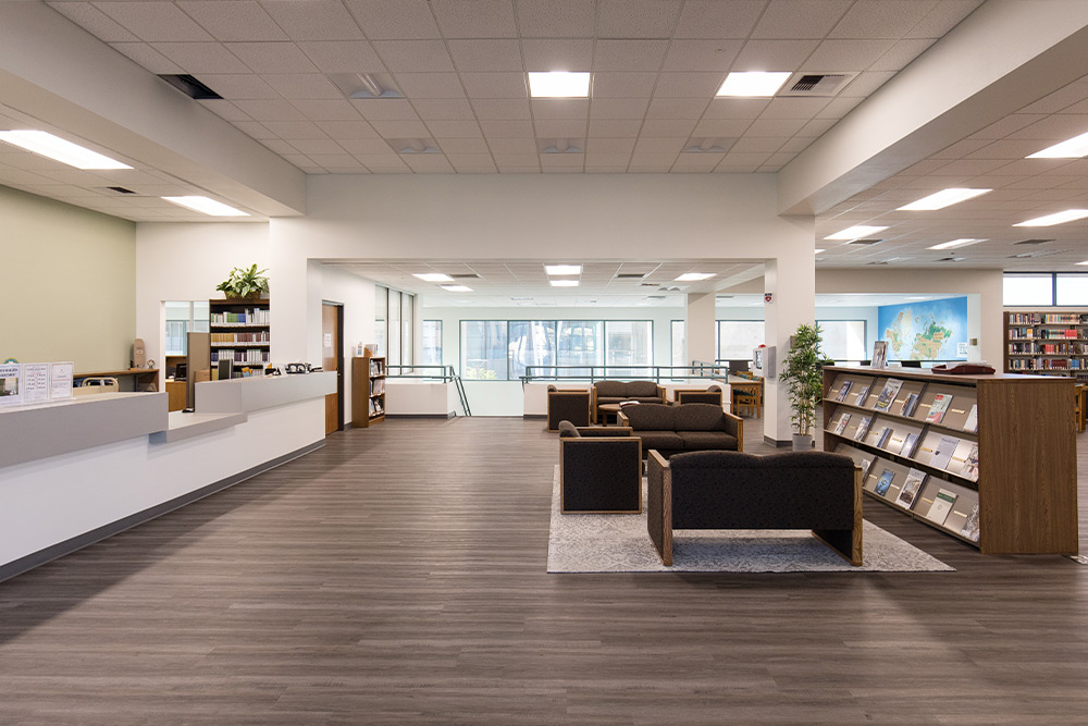 The upper floor of the main library and circulation desk