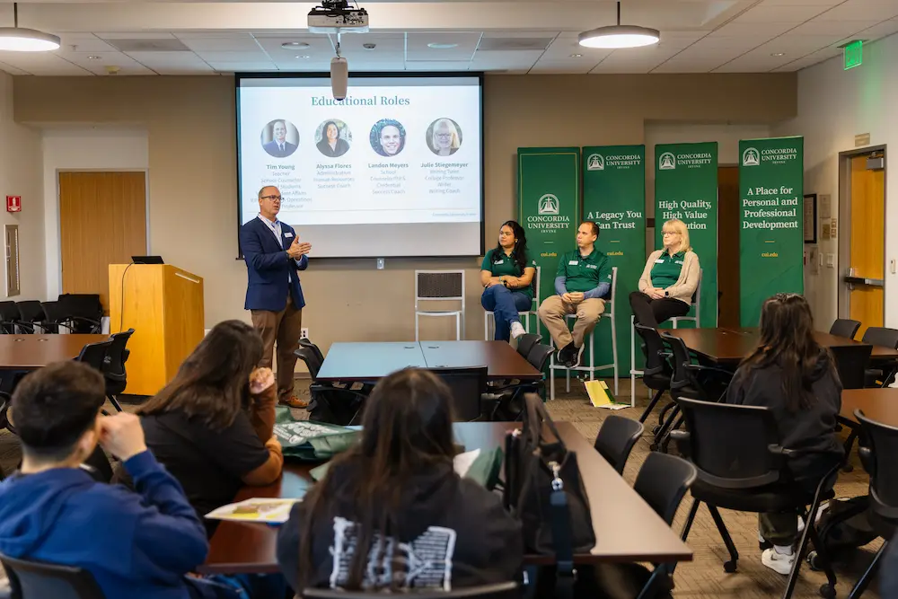 Panel presenting to audience