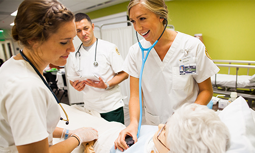 Nurses treating a patient