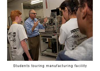 Students touring manufacturing facility