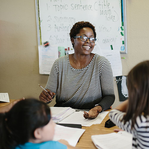 A teacher educating a class