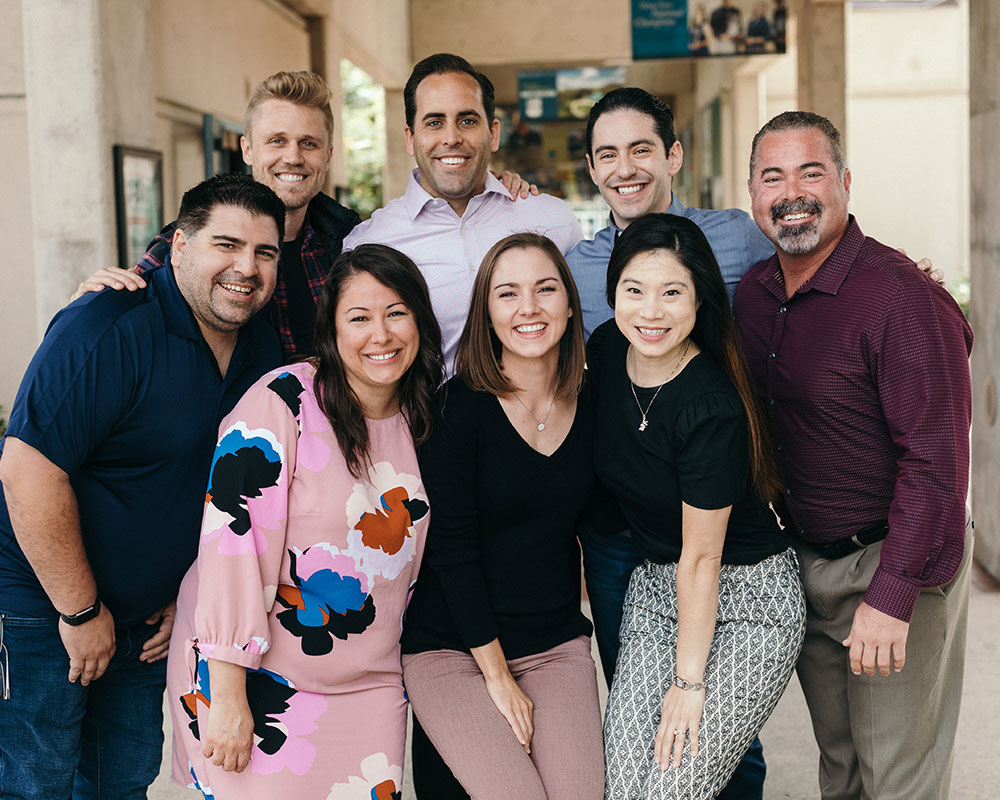 Alumni posing for a photo