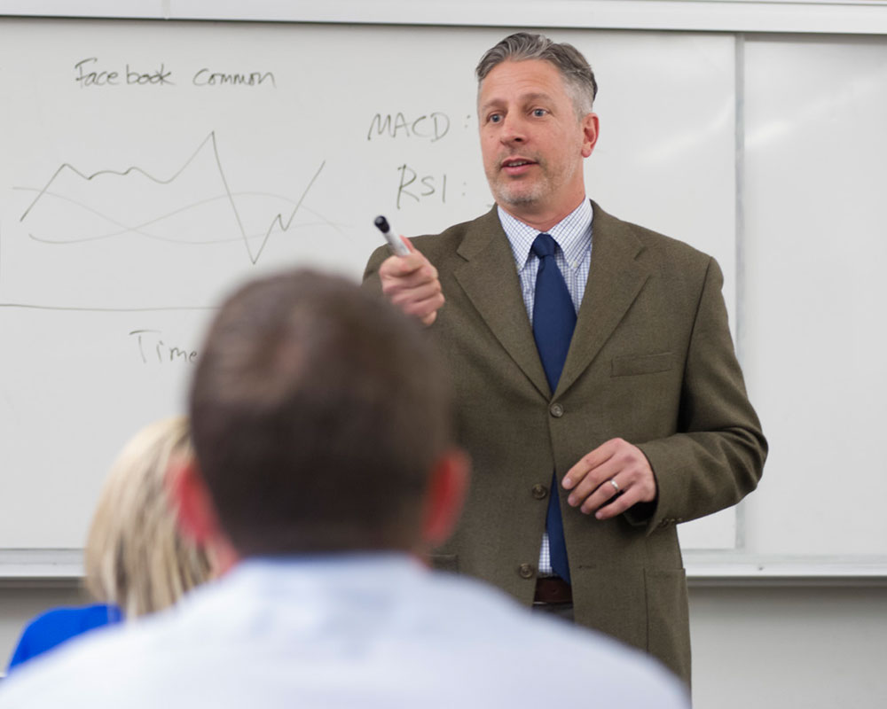 Professor calling on a student in class