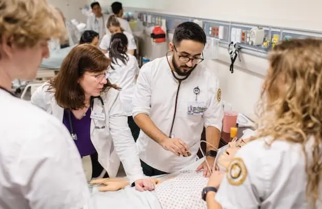 Nursing students with professors