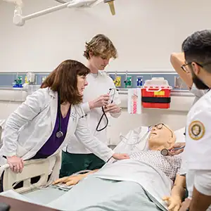 Two people having a conversation in a hospital