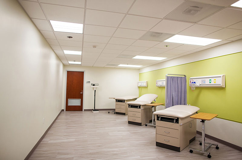 Hospital style examination beds