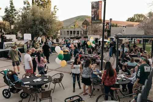 Crowd of people socializing