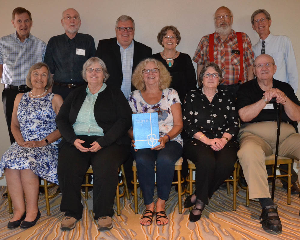 Standing - Wayne Schmidt, Karl Kraft, Tim Hebel, Karen (Langevin) Hebel, Jerry Matthews, Jim Buehler; Seated - Linda Kraft, Carole (McMichael) Matthews, Andrea (Becker) Mayfield, Gretchen Breiling, Michael Sebastian