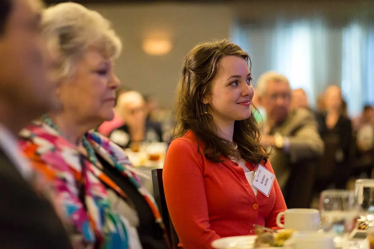 Attendees at their tables