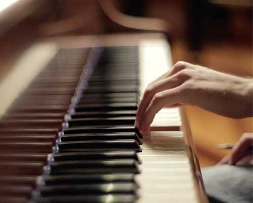 Image of a musician with an instrument.