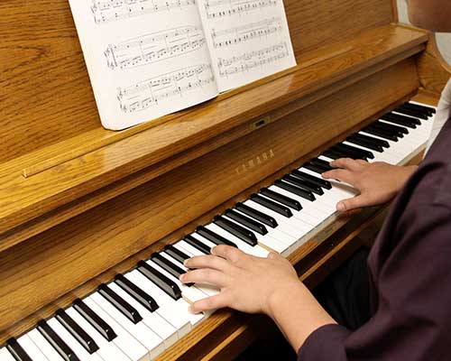 Image of a musician with an instrument.