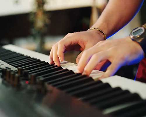 Image of a musician with an instrument.
