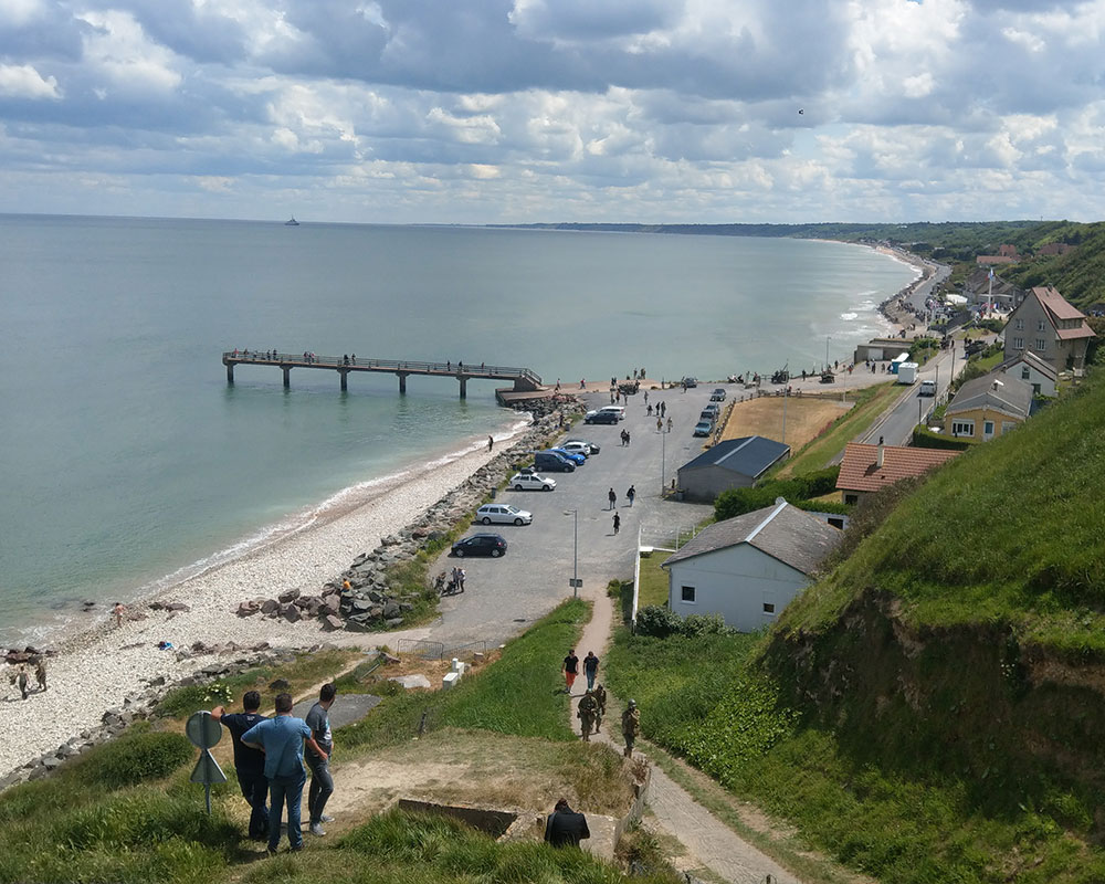 Viewing our parade route, which started at the pier and continued for a mile down the road hugging the beach, from a Nazi bunker (photo credit: Jeff Held)