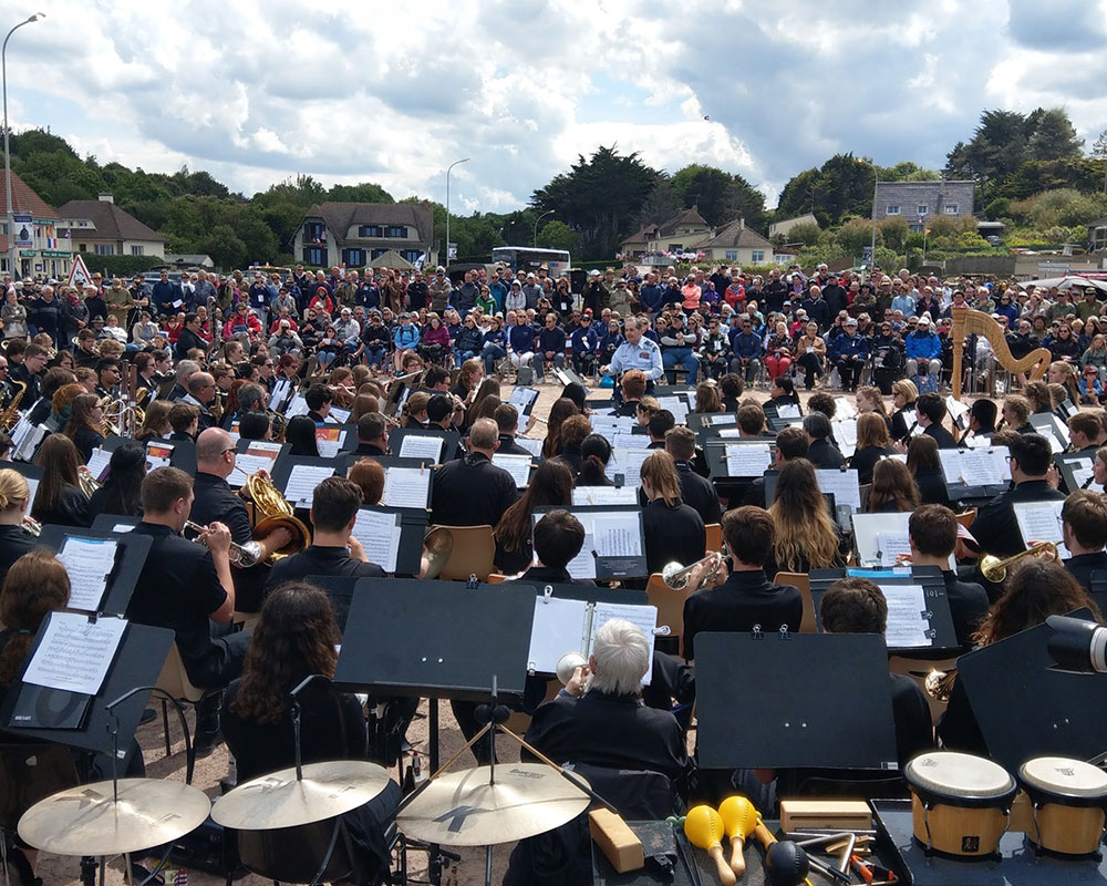 D-Day Memorial Wind Band is conducted by Col. Arnald Gabriel at the location where he landed as a soldier on D-Day (photo credit: Andrew Parker)