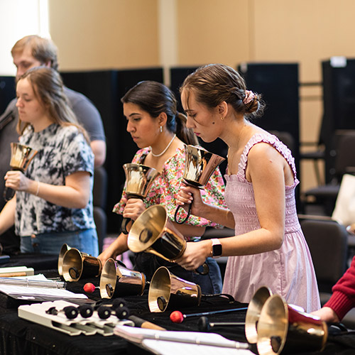 Women playing hanbells