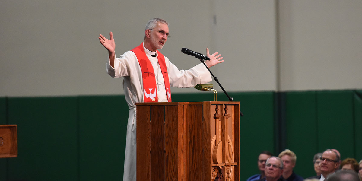 Rev. Dr. Mark Brighton giving a sermon