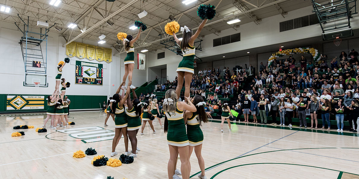 CUI Cheer and Stunt performing for the fans