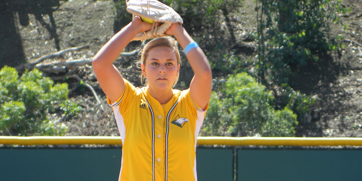 CUI Softball pitcher preparing to throw
