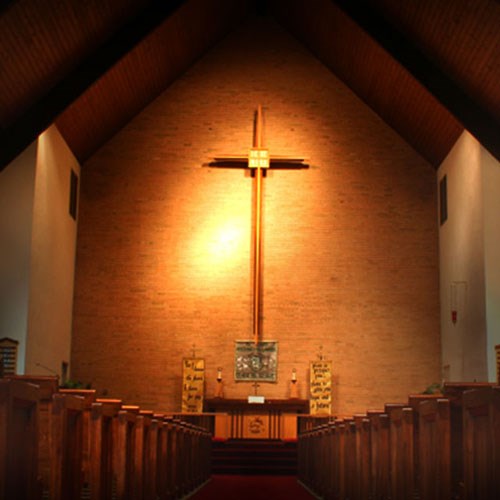 A cross above an alter