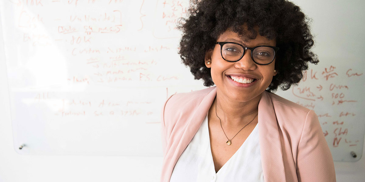 A woman smiling.