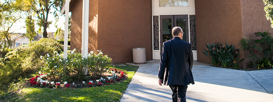 Pastor walking to chapel